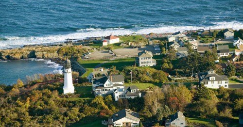 An overhead view of Cape Elizabeth, Maine, with the famous Portland Head Light overlooking the water.
