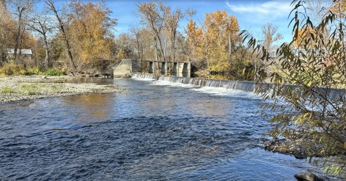 A small dam along the Boise River at Eagle Island State Park in Idaho.