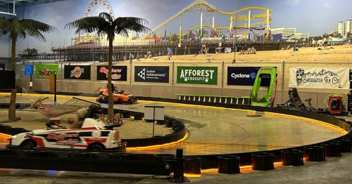 Kids race on an indoor go-kart track at Crazy Pinz in Fort Wayne, Indiana
