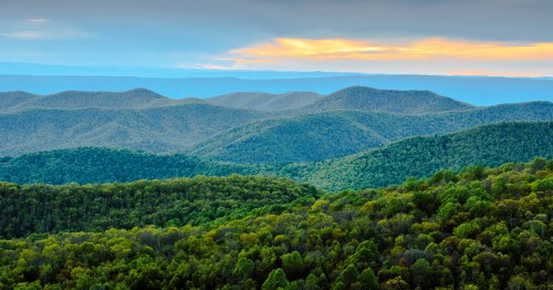Layers upon layers of mountains as seen from an overlook in Shenandoah National Park at sunrise.