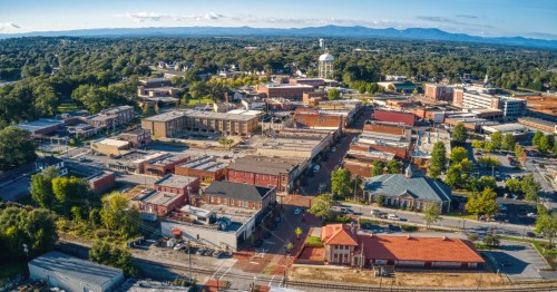aerial of the historic buildings and brick streets of greer, south carolina