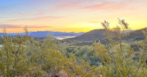 views of lake pleasant from a nature trail during sunset