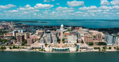 A city sits on an isthmus between two lakes.