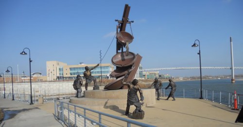 Bronze laborer sculpture near the riverfront at Lewis and Clark Landing in Omaha, NE.