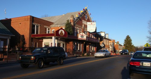 Historic downtown Abingdon, showing the Barter Theatre and other historic brick buildings under a blue sky