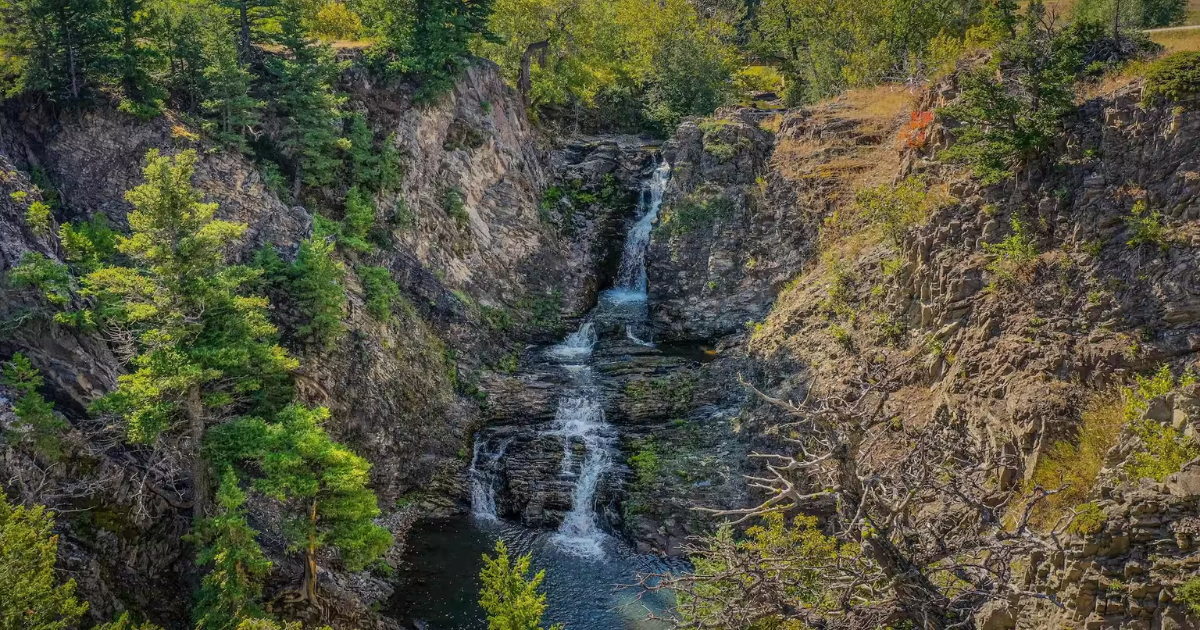 This Montana Airbnb Has a 40-Foot Waterfall, Swimming Hole, and Unreal Views