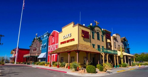 Colorful Western-themed storefronts in the town of Pahrump, NV.