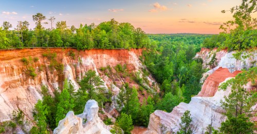 Sunset view over dramatic canyon formations at Providence Canyon State Park in Georgia.
