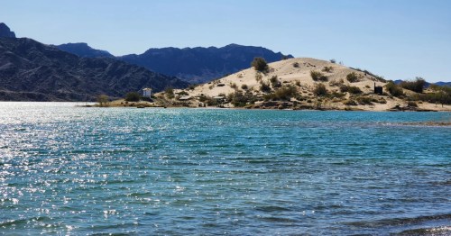 Island and shoreline view from Three Dunes Trail at Cattail Cove State Park in Arizona.