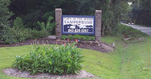 entrance sign to Tuck In The Wood Campground in saint helena island south carolina