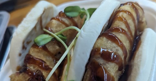 Soft steamed bao buns with crispy filling and savory glaze in Detroit, Michigan.