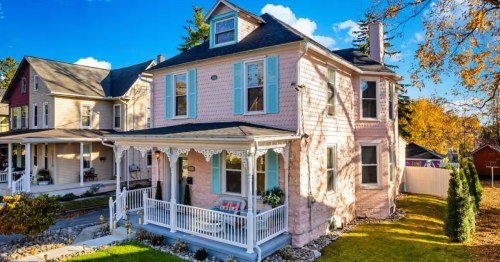The candy-colored facade of a two-story Airbnb in Hershey, Pennsylvania