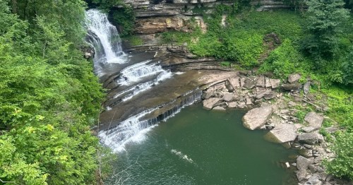 A swimming hole in Tennessee surrounded by a forest.