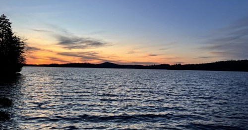 A look out at Middle Saranac Lake in New York at sunset.
