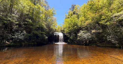 A hidden waterfall swimming hole in North Carolina.