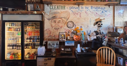 Inside the quirkiest town in Arizona, Cleator. The interior of a bar with a skeleton bartender.