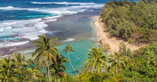 aerial shot of the ke'e beach and its lagoon in hawaii