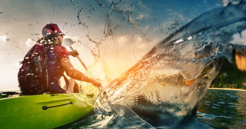 A kayaker paddles through the water in an outdoorsy town in Ohio.