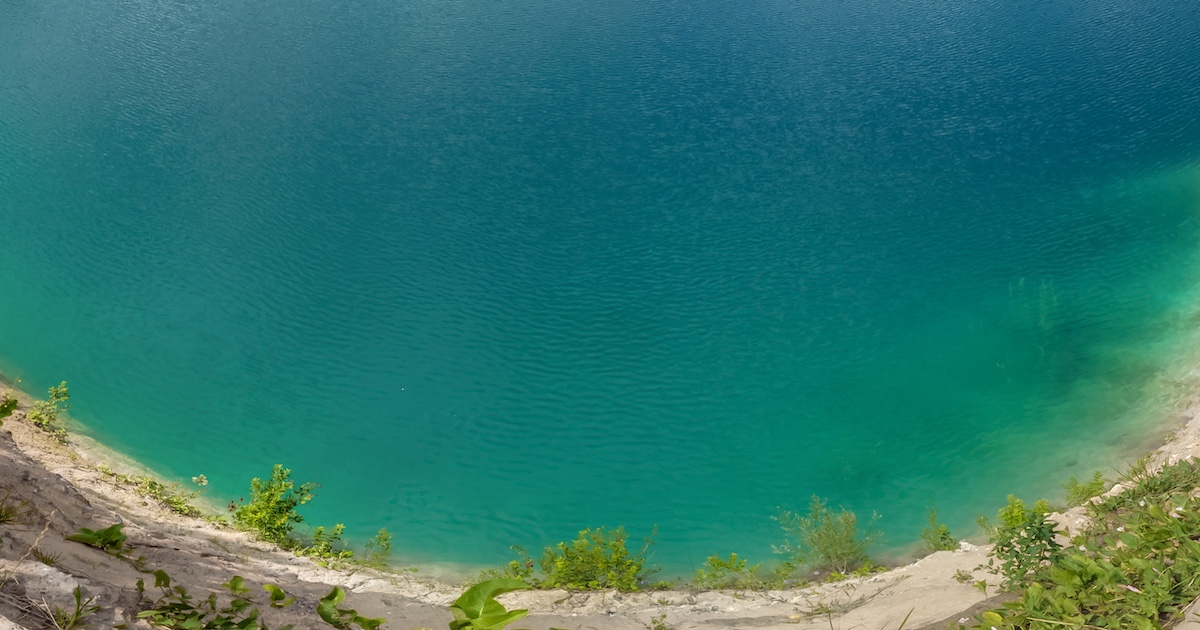 Locals Love This Crystal-Clear Swimming Hole in Wisconsin (That Doesn't Feel Like the U.S.)