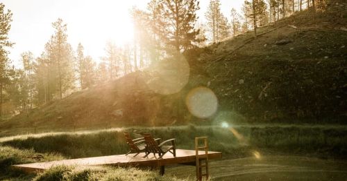 Sunrise over a pond in the Black Hills of South Dakota