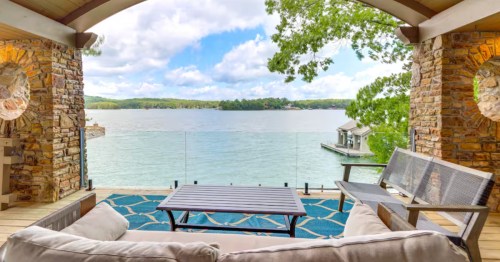 A waterfront rental in Georgia overlooking a beautiful blue lake.