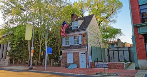 Betsy Ross house and Hanging American Flag in Philadelphia PA.