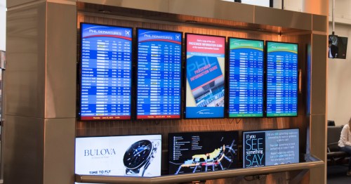 arrivals and departures boards at philadelphia international airport (PHL) in Pennsylvania