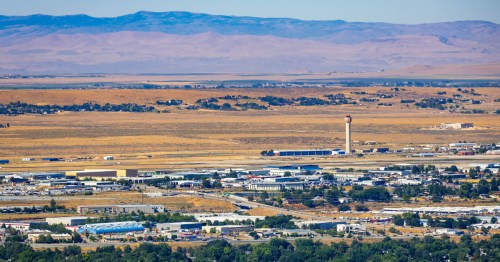 aerial shot of boise airport (BOI) with mountains in the background in idaho
