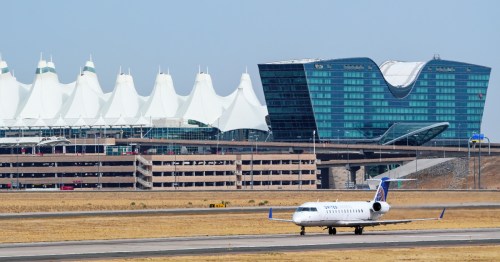 a plane on the runway at Denver International Airport (DEN) in Colorado
