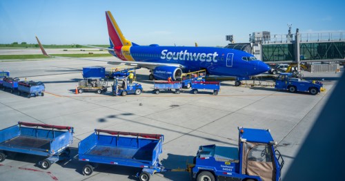 a southwest plane at a jetway at Kansas City International Airport (MCI) in Kansas City MO