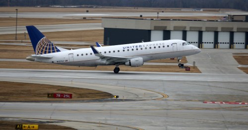 a united express plane lands at General Mitchell International Airport (MKE) in Milwaukee, Wisconsin