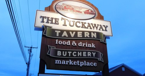 sign outside the tuckaway tavern and buthchery in raymond ne hampshire