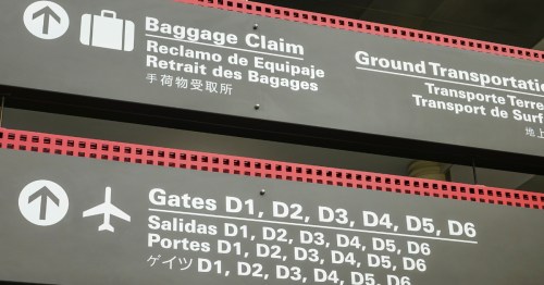 baggage claim and gate directional signs at Louis Armstrong New Orleans International Airport (MSY) in Louisiana