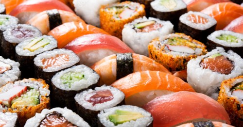 Large assortment of fresh sushi rolls and nigiri at the all-you-can-eat Feast Buffet in Columbus, Ohio.
