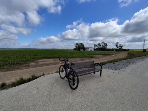 A bike against a benchin the middle of the Delta Heritage Trail in Arkansas.